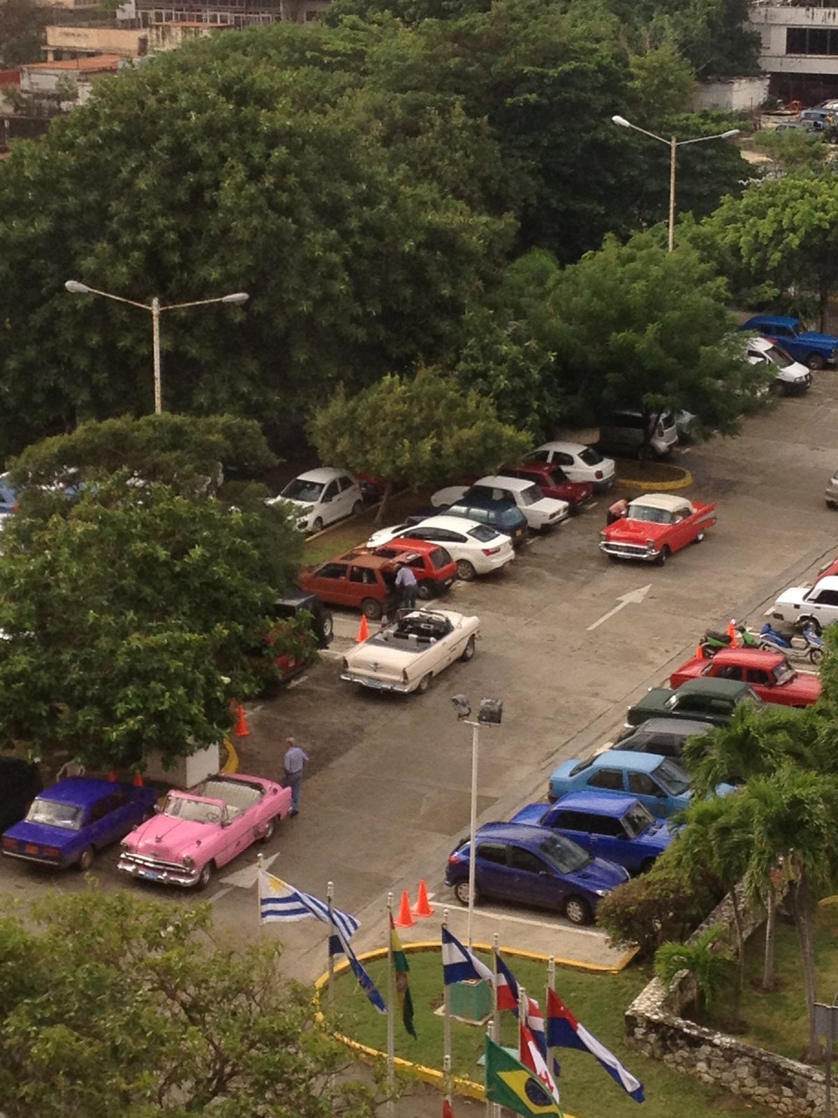 A more typical mix of cars in the hotel parking lot.  1950's American cars were used mostly as...